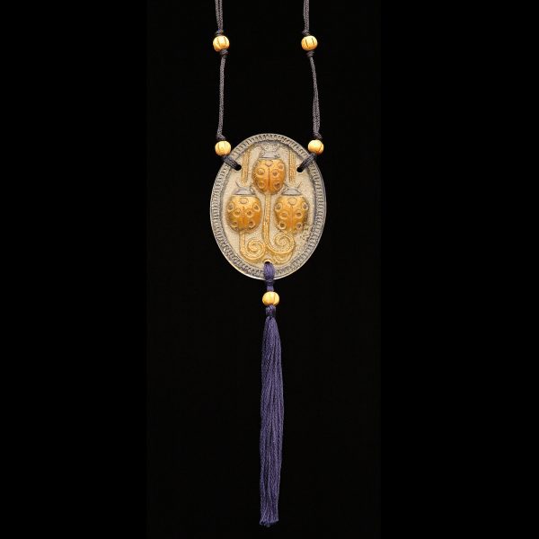 Páte-de-verre pendant with ladybird design
