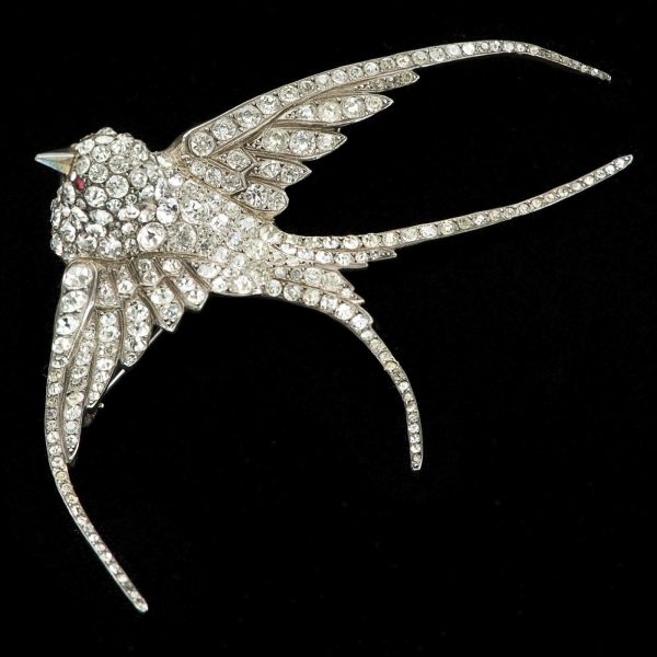 Edwardian swallow brooch. Silver set with pastes. Original fitted case