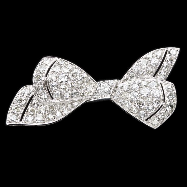 Art Deco platinum and diamond bow brooch. Total diamond weight 4.20ct, G-I colour