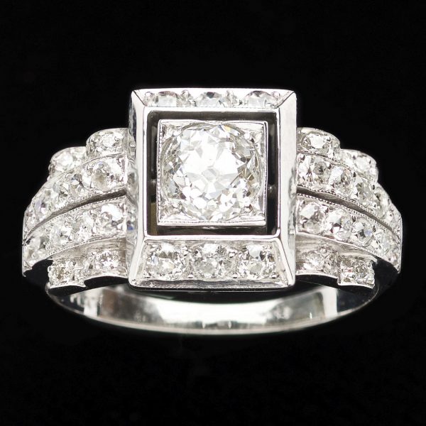 Art Deco style platinum diamond ring set with a central diamond 0.72ct