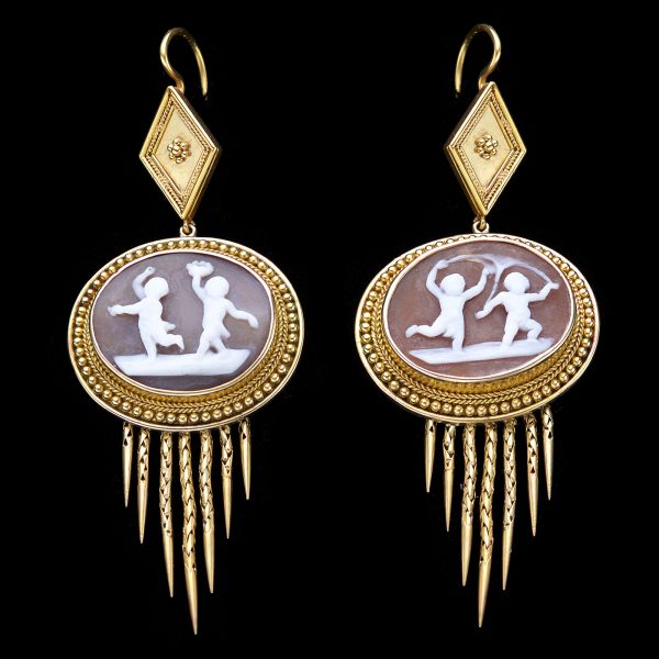 Neo-classical cameo earrings depicting cherubs at play in fine 18ct gold tasselated settings