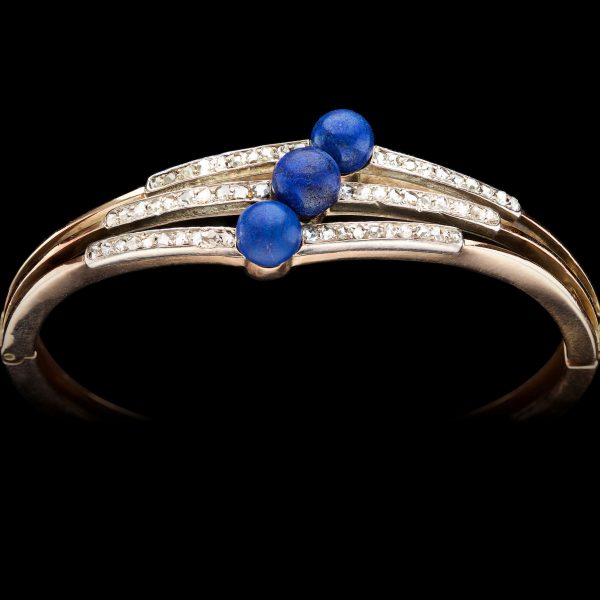 Victorian hinged gold bangle with three rows of small diamonds and three lapis lazuli beads