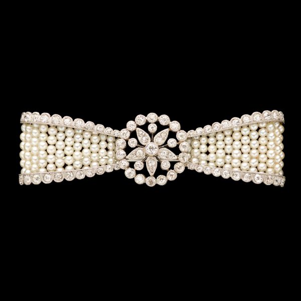 Exquisite Edwardian pearl, diamond and platinum bow brooch