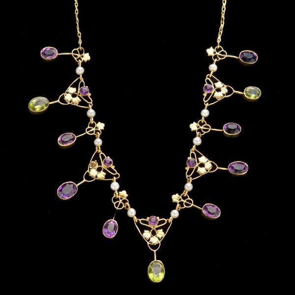 Gold 'suffragette' necklace set with amethysts, peridots and pearls