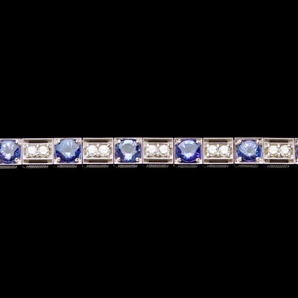 1960’s 18ct white gold bracelet set with 11 blue tanzanites 12.03ct total, and 22 diamonds total 2.42ct G-H colour