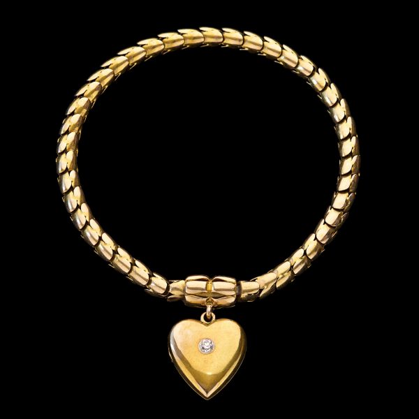 Victorian 18ct gold serpentine chain bracelet with diamond set heart pendant