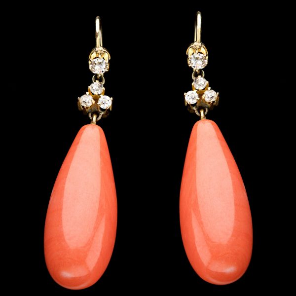 Victorian coral lozenge shaped earrings, gold mounted and set with diamonds