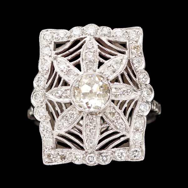 Edwardian diamond platinum ring with a daisy design in diamonds .80 + 1.32 ct