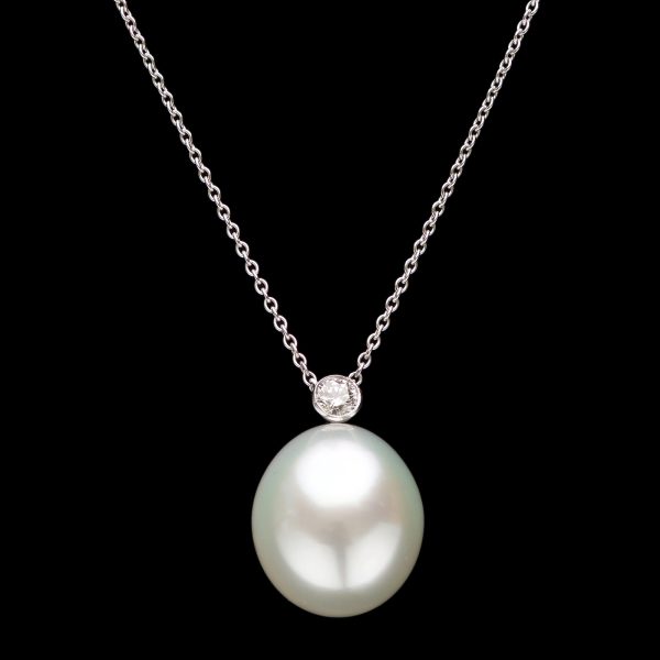 14mm perfect South Sea pearl pendant mounted with a 0.20 diamond